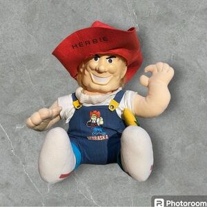 Vintage herbie husker 1987 sits up by self doll